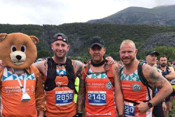 Jenson’s dad Craig Edwards in Bear Costume, next to Dan Davies, Craig Hughes and James Beck, against the backdrop of Mount Snowdon, after the Snowdon Trail Half Marathon the week before.
