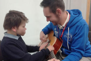 Hudson helps disabled children to experience the joy of making music