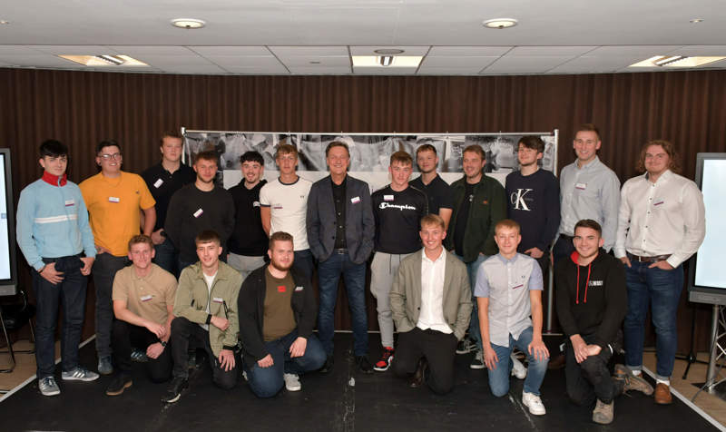 Construction apprentices on stage
